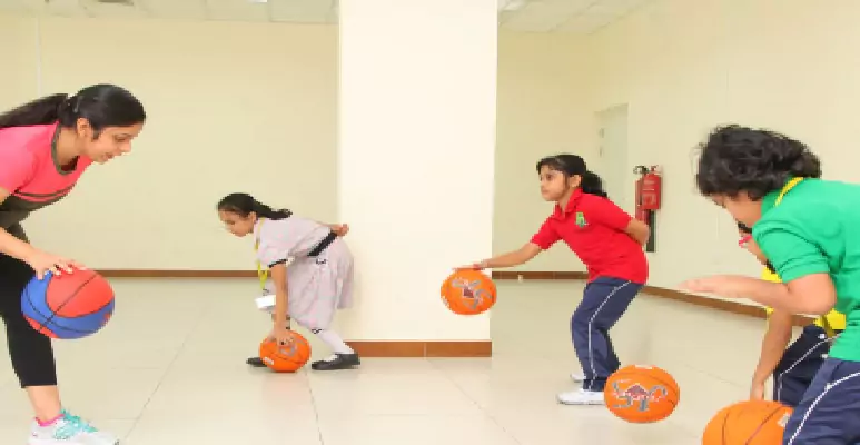 woodlem-park-school-ajman-playing-basketball